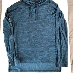 Blue Kyodan athletic hoodie with flattering split hem detail